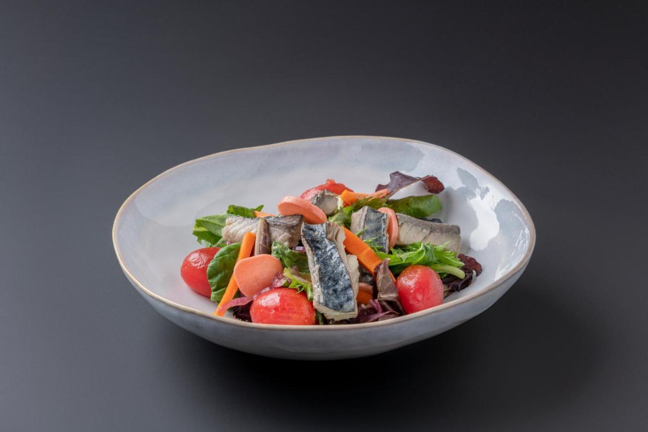 Eurostars Portico อาลิกันเต ภายนอก รูปภาพ A salad with sardines